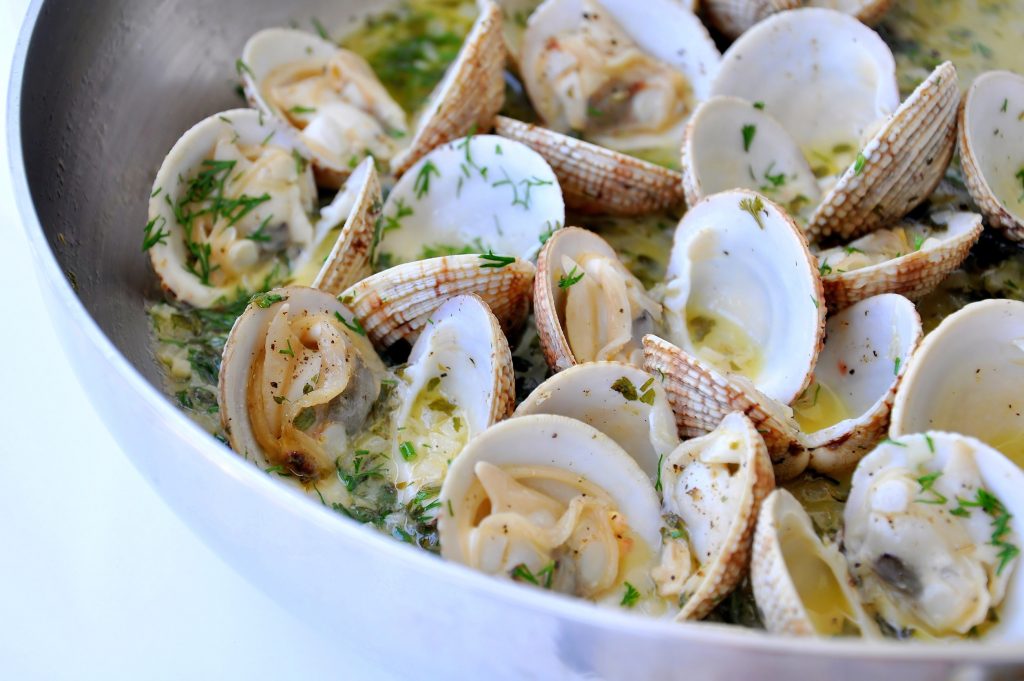LITTLE NECK CLAMS IN A WINE/AGED BALSAMIC SAUCE The Olive Oil Taproom